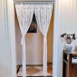 élément décoratif en macramé écru